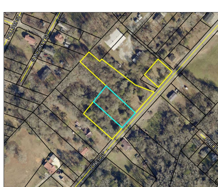 0.59 acres: one duplex, three parking spaces